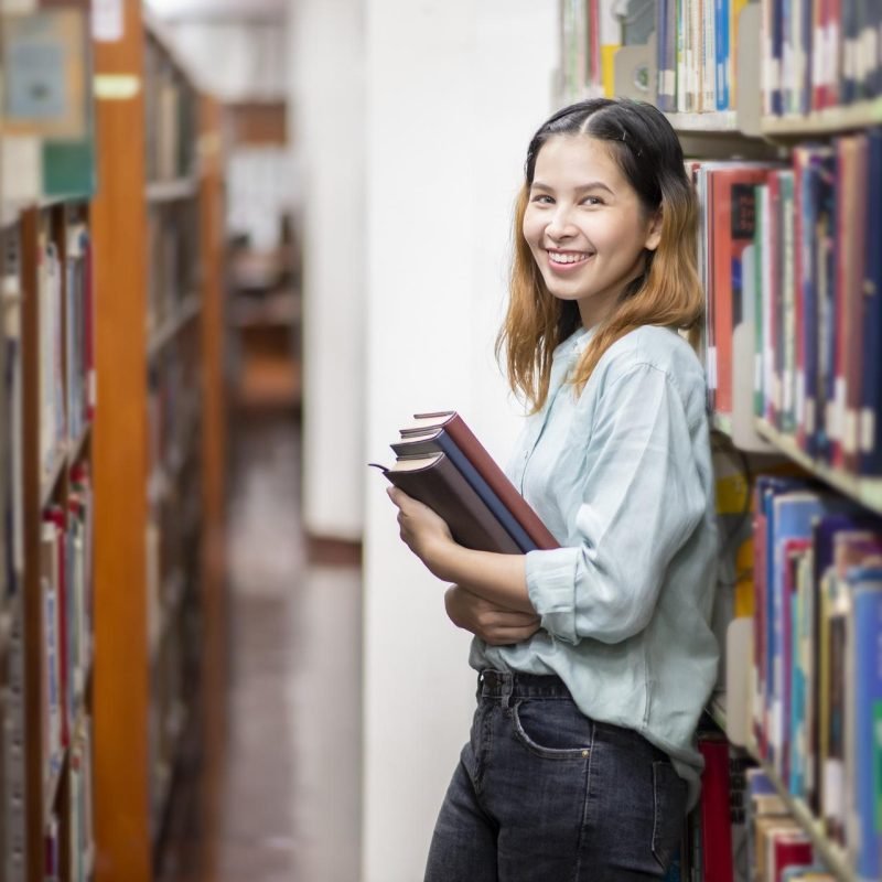 Happy young Asian University student.